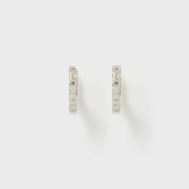 Arms Of Eve Holi Silver Huggie Earrings