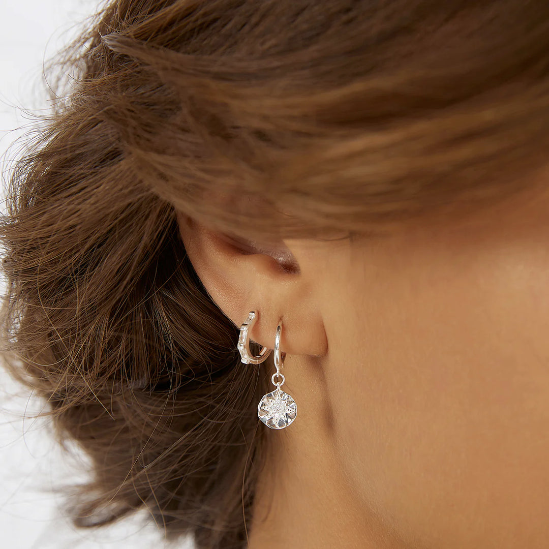 Arms Of Eve Holi Silver Huggie Earrings