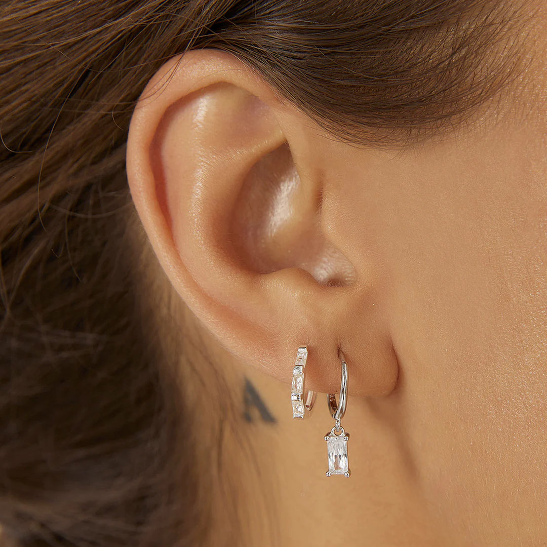 Arms Of Eve Holi Silver Huggie Earrings