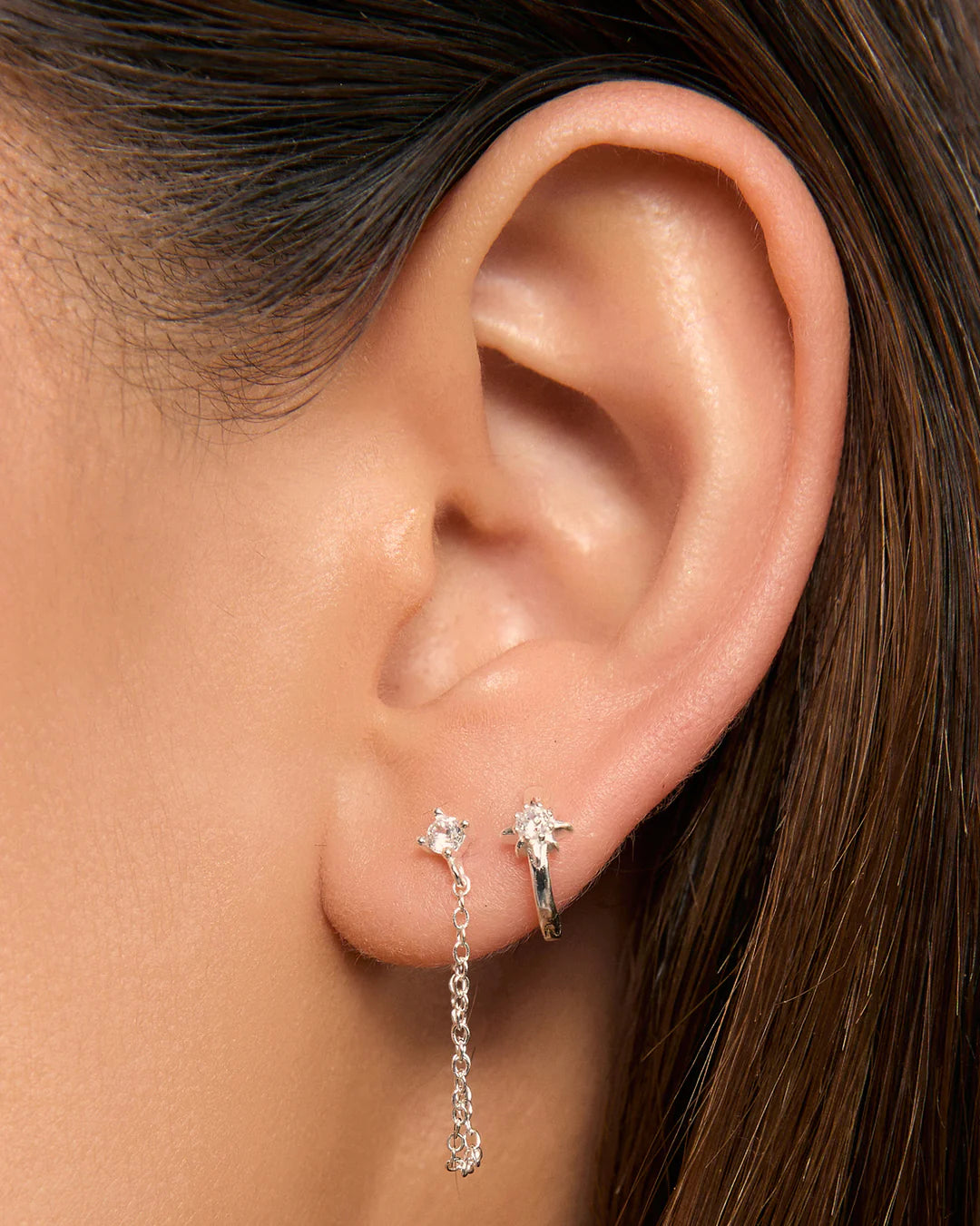 Arms Of Eve Nova Silver Huggie Earrings
