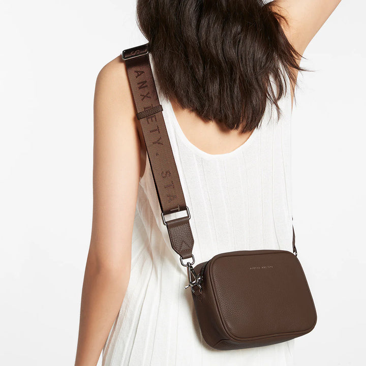 Status Anxiety Crossbody Plunder Bag with Webbed Strap - Cocoa