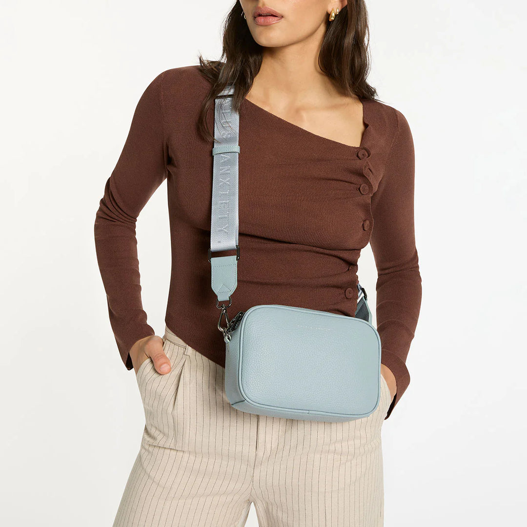 Status Anxiety Crossbody Plunder Bag with Webbed Strap - Powder Blue