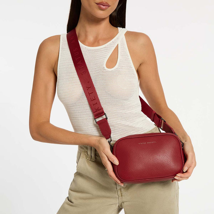 Status Anxiety Crossbody Plunder Bag with Webbed Strap - Rogue