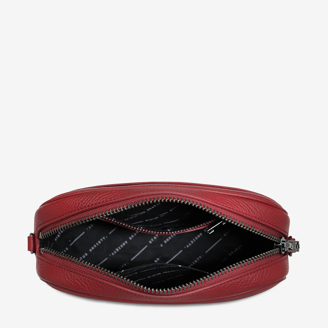 Status Anxiety Crossbody Plunder Bag with Webbed Strap - Rogue