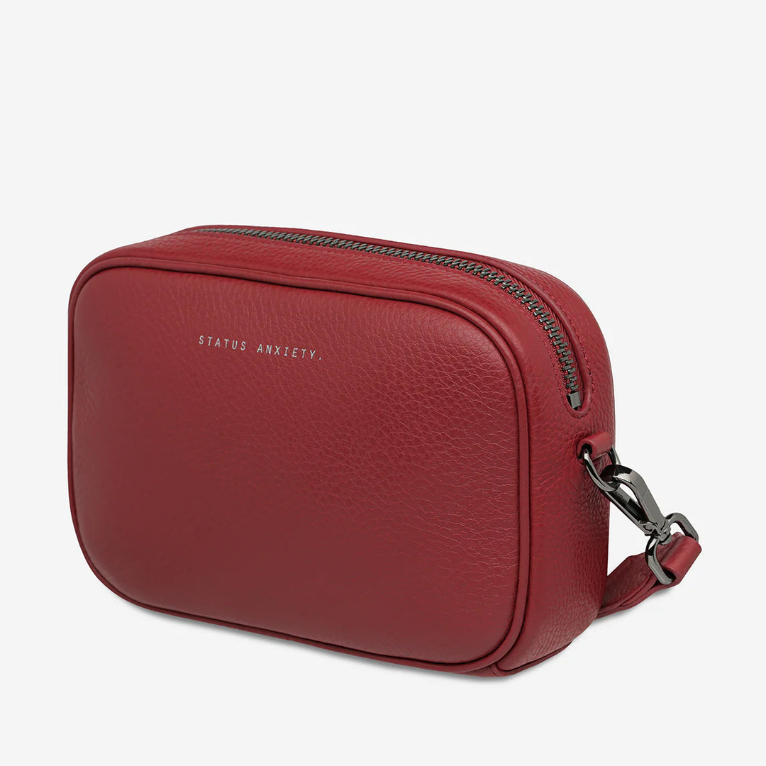 Status Anxiety Crossbody Plunder Bag with Webbed Strap - Rogue