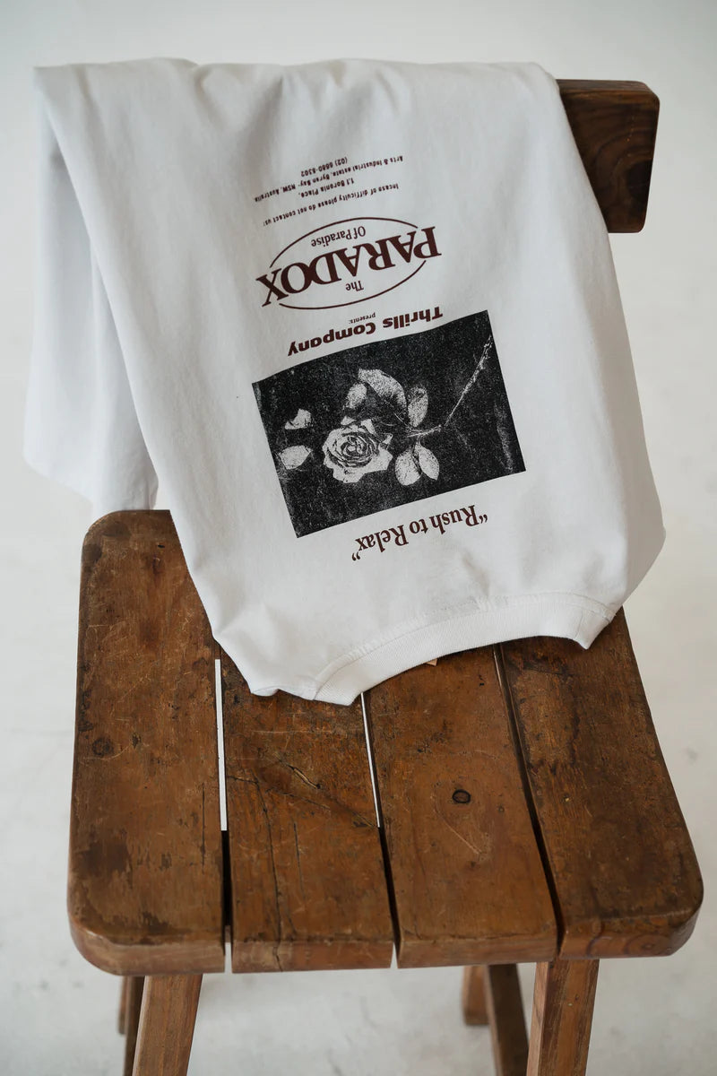 The Paradox of Paradise Merch Fit Tee - White