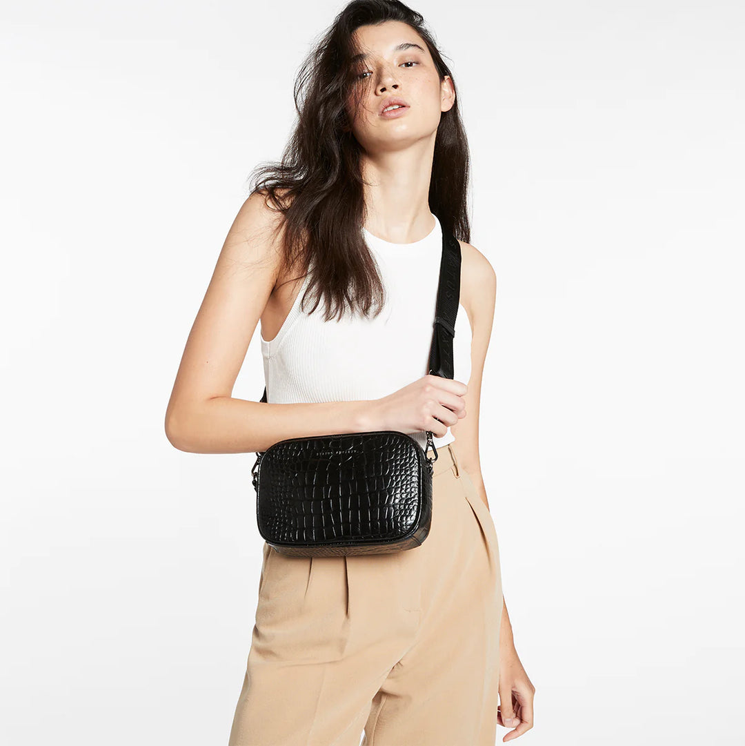Status Anxiety Crossbody Plunder Bag with Webbed Strap - Black Croc Emboss